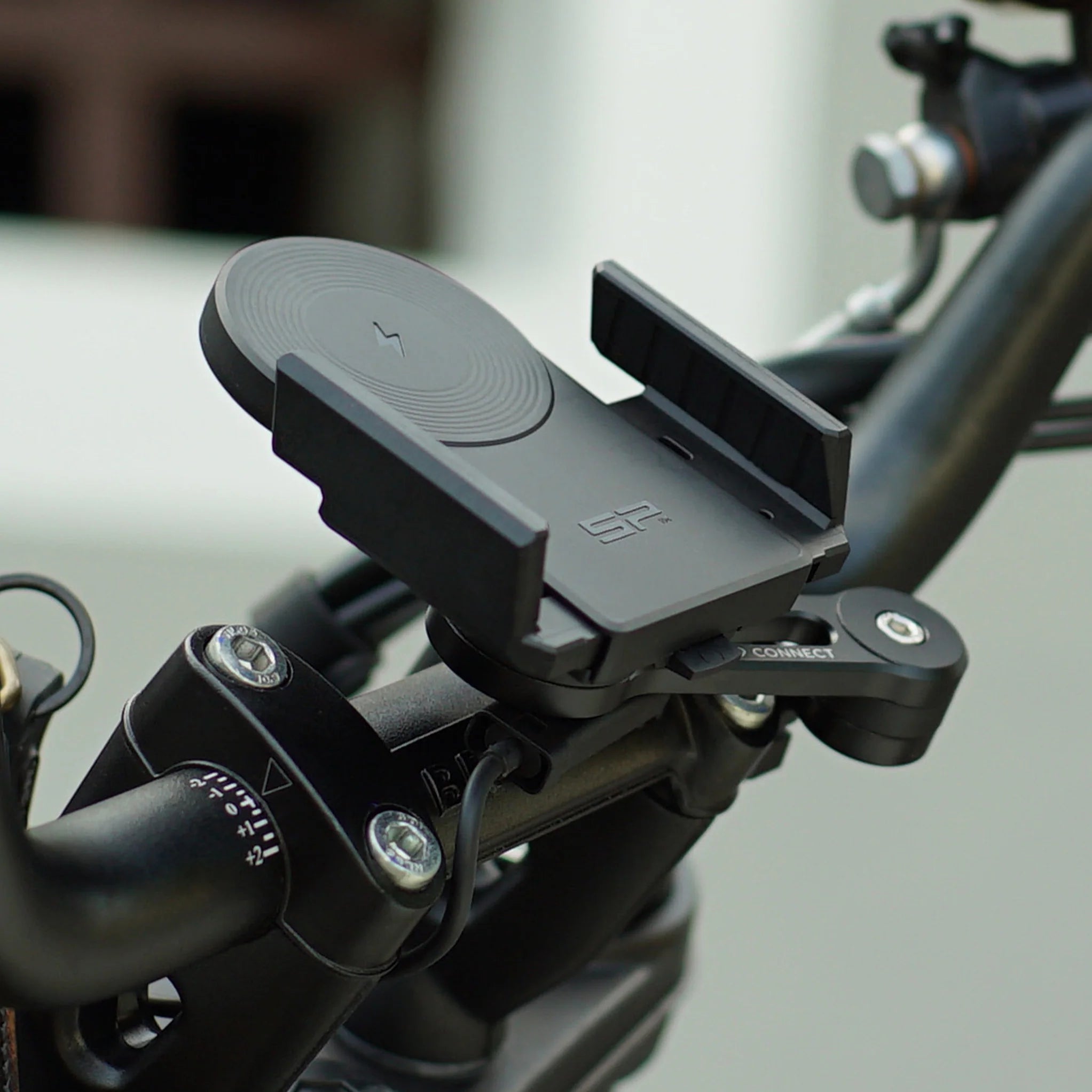 SP Universal Holder med lader til MC